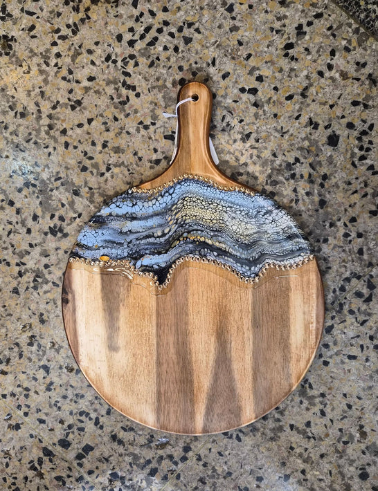 I am a Mixed media Artist. I presently create Acrylic Pour Charcuterie boards. Coating every board with Art Resin, preserves the design & makes it pop. I can always count on Art Resin to give my boards that finishing touch!